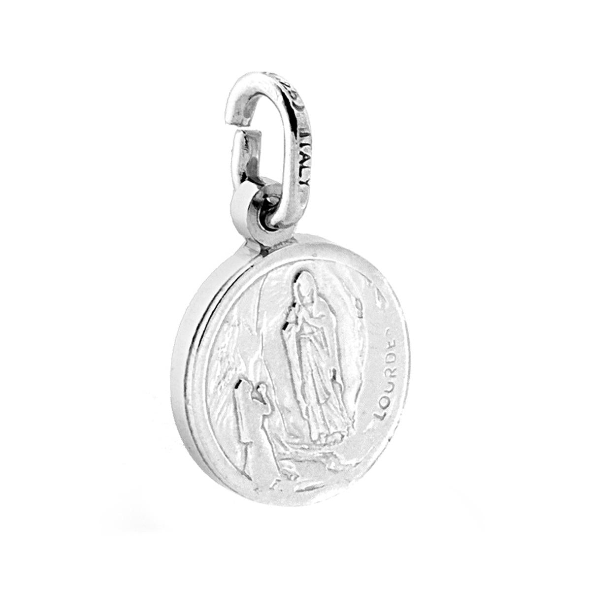 Ciondolo Sacro Medaglietta a forma tonda con immagine in bassorilievo della Maddonna di Lourdes.<BR>Made in Italy