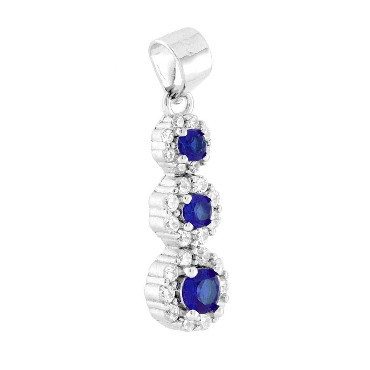 Ciondolo trilogy Degradč con fiori con Cubic zirconia colore Blu Zaffiro al centro e cubic zirconia bianchi incastonati intorno.