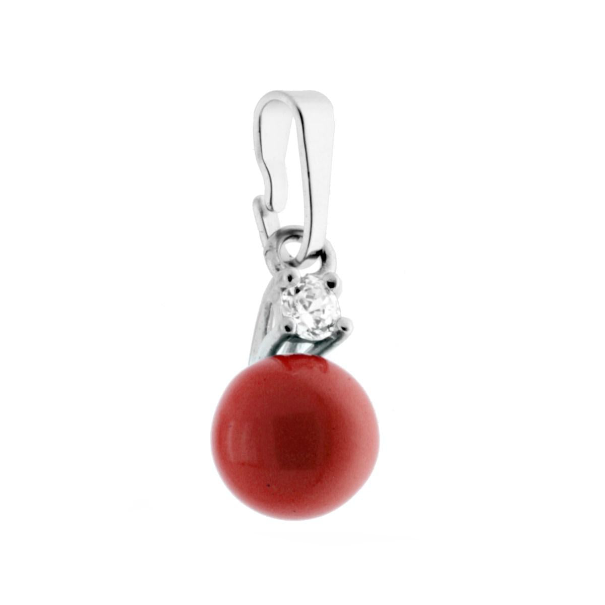 Ciondolo Perla Corallo con Punto Luce Zircone Bianco con montatura griffe.<BR>Made in Italy