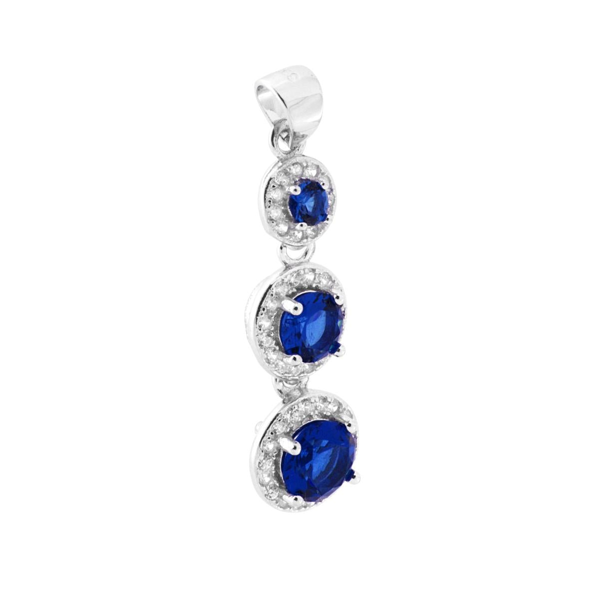 Ciondolo Trilogy con Zirconi a forma Tonda colore Blu Zaffiro contornati con Zirconi Bianchi.