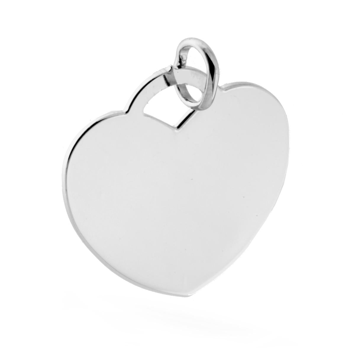 Ciondolo a forma di Piastrina Cuore, con lavorazione liscia e lucida.<BR>Made in Italy
