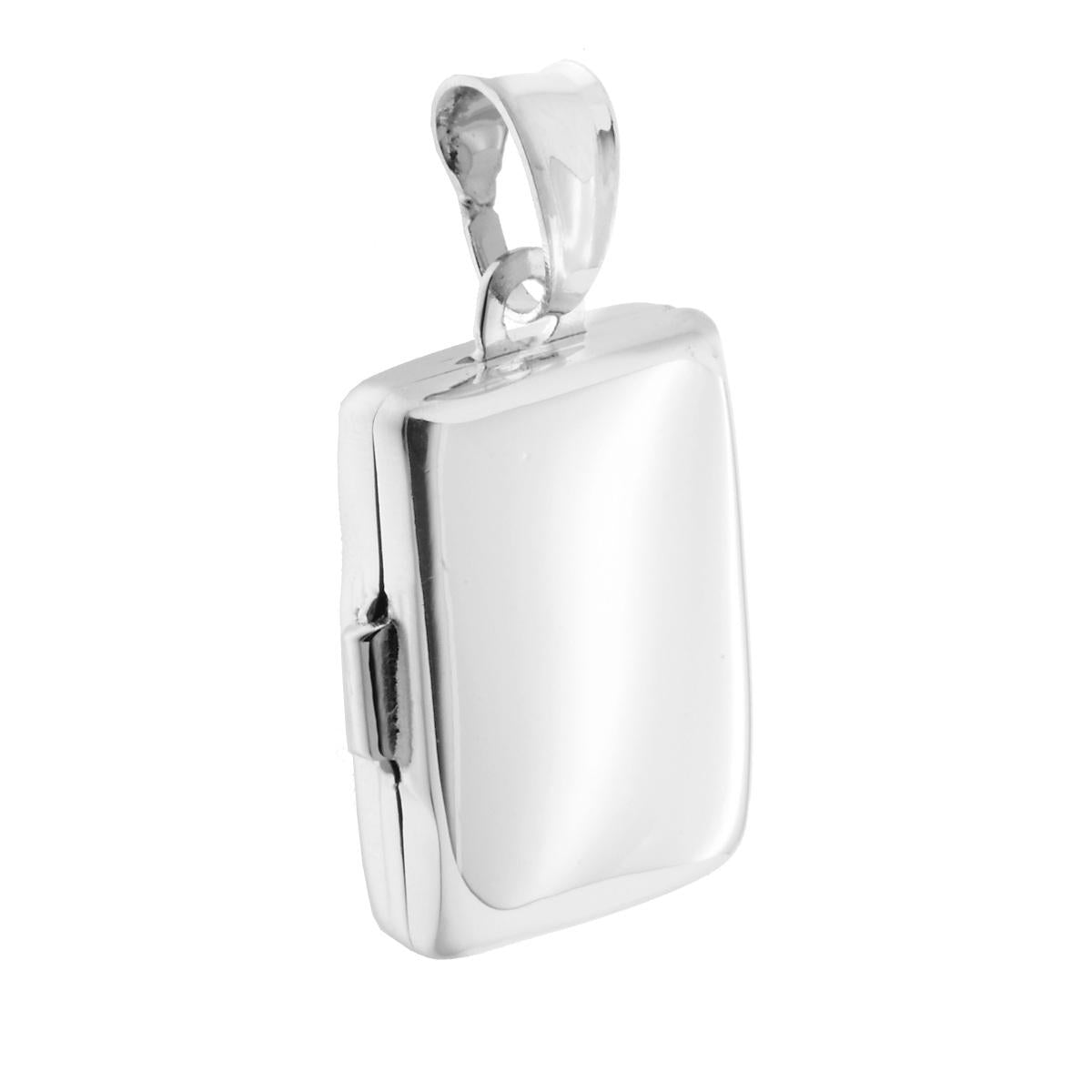 Ciondolo Portafoto a forma Rettangolare bombato con lavorazione liscia,apribile con interno due piccoli contenitori uguali e coincidenti.<BR>Perfetti per custodire i ricordi pi belli!!<BR>Made in Italy