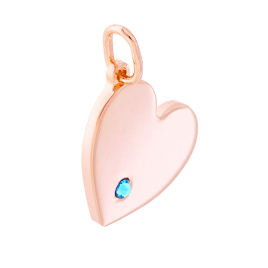 Ciondolo a forma di Cuore Plain con finitura liscia e lucida, con zircone Azzurro incastonato.<BR>Made in Italy