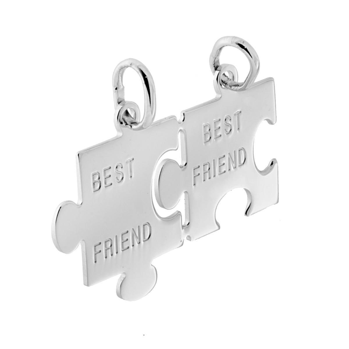 Ciondolo a forma di Puzzle Spezzato che si spezza con lavorazione Liscia e Lucida.<BR>Incisione " Best Friend "<BR>Made in Italy