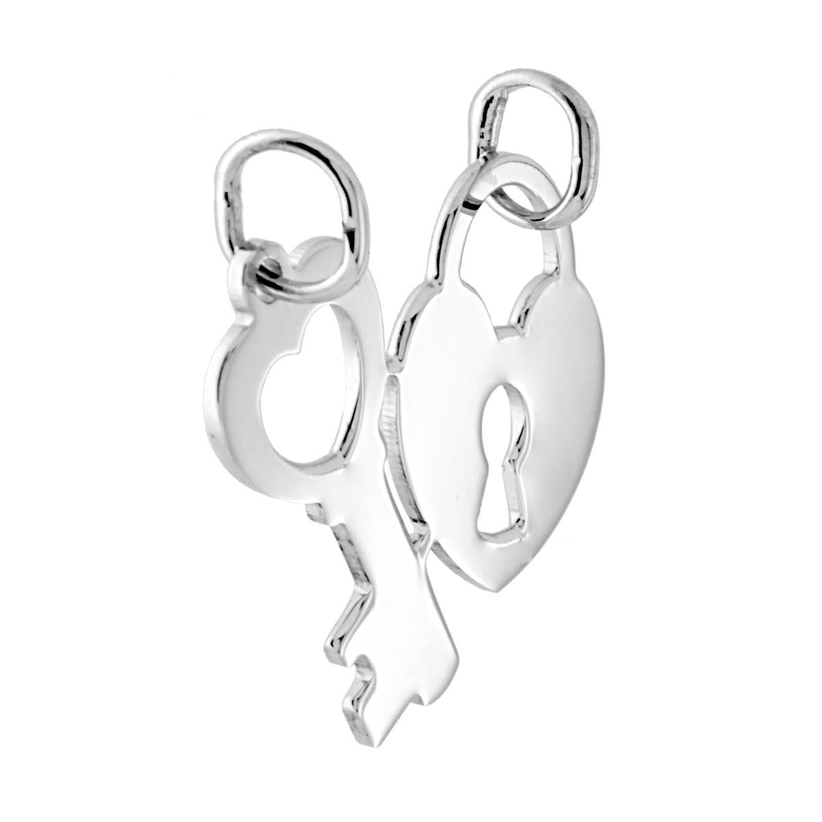 Ciondolo a forma di Cuore e Chiave che si dividono con lavorazione Liscia e Lucida.<BR>Made in Italy<BR>