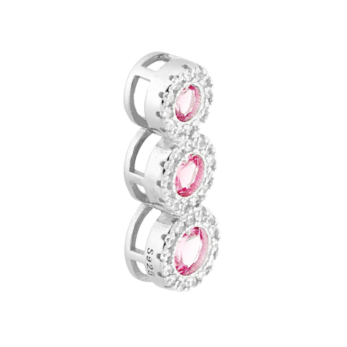Ciondolo trilogy con passante per catena composto da zirconi tondi rosa con zirconi bianchi incastonati intorno.<BR>