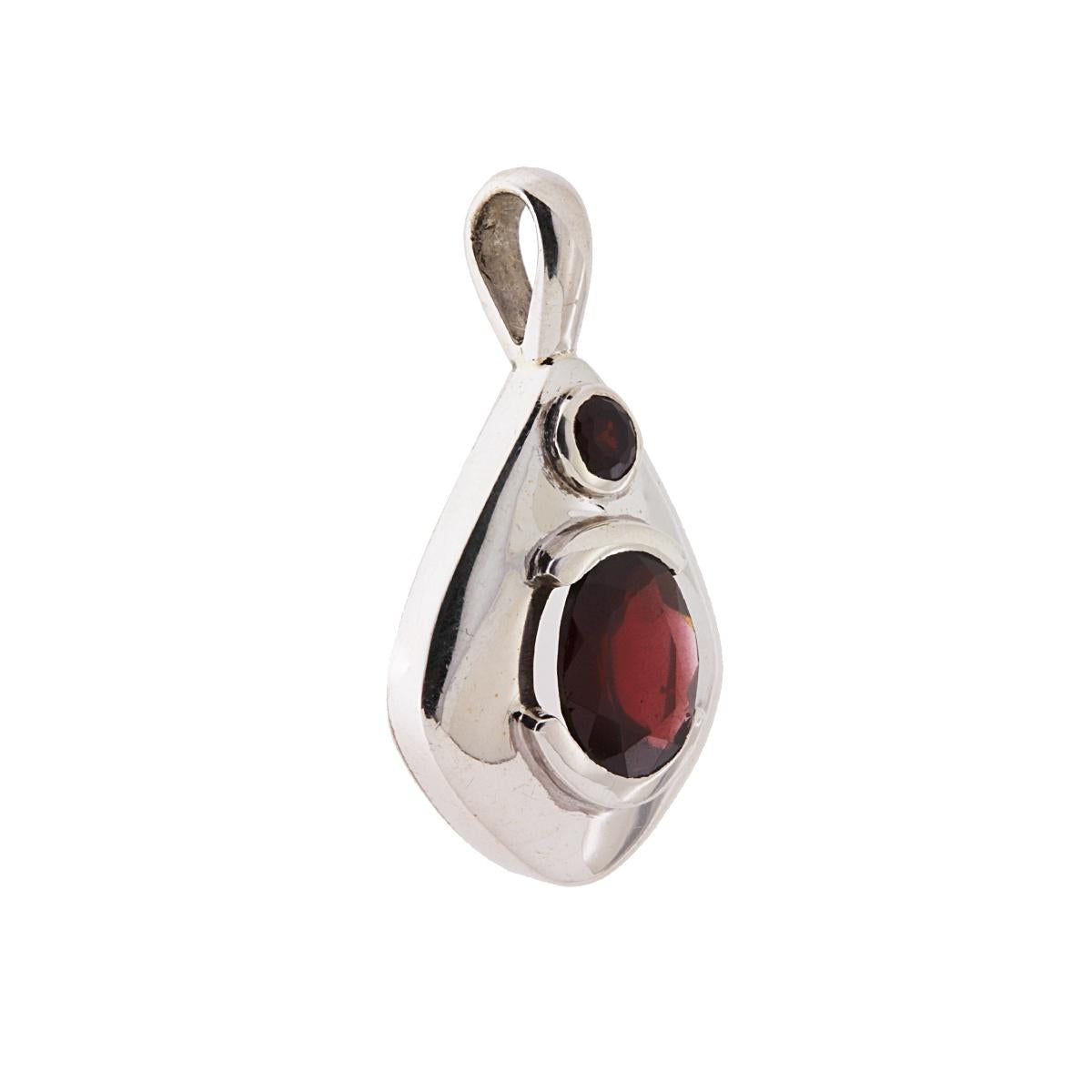 Ciondolo Etnico a forma di goccia con Pietre Granato incastonate.<BR>