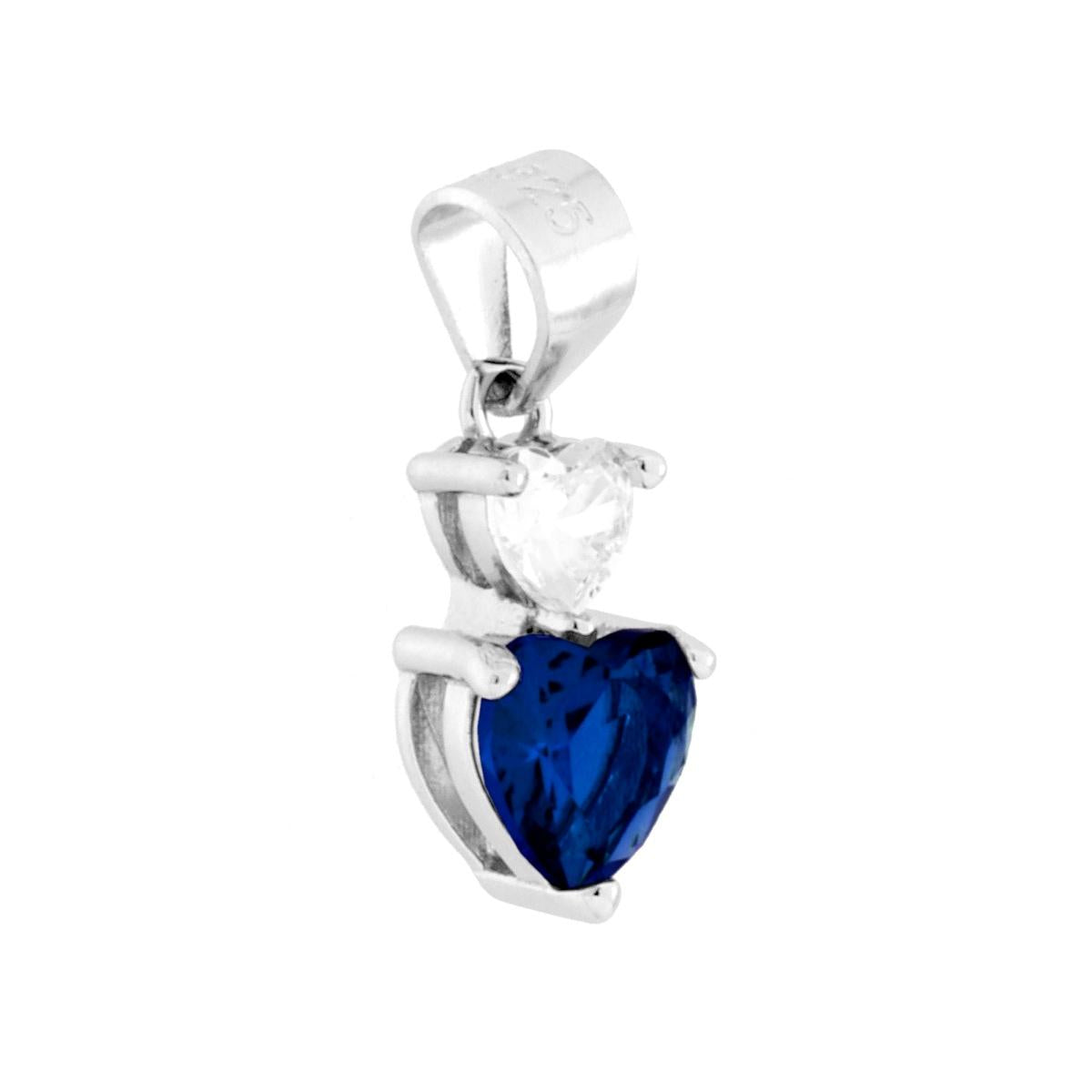 Ciondolo punto luce con due cubic zirconia colore Bianco e Blu Zaffiro a forma di cuore montati su 3 Griffe.<BR>