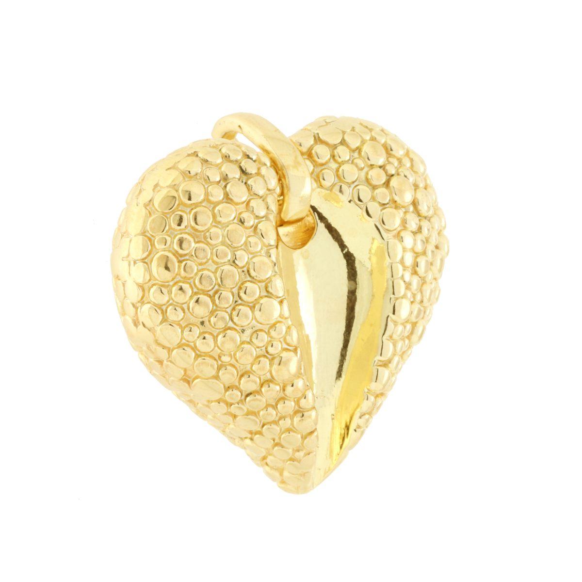 Ciondolo a forma di cuore bombato con finitura lucida e con lavorazione effetto pallinato.<BR>Made in Italy